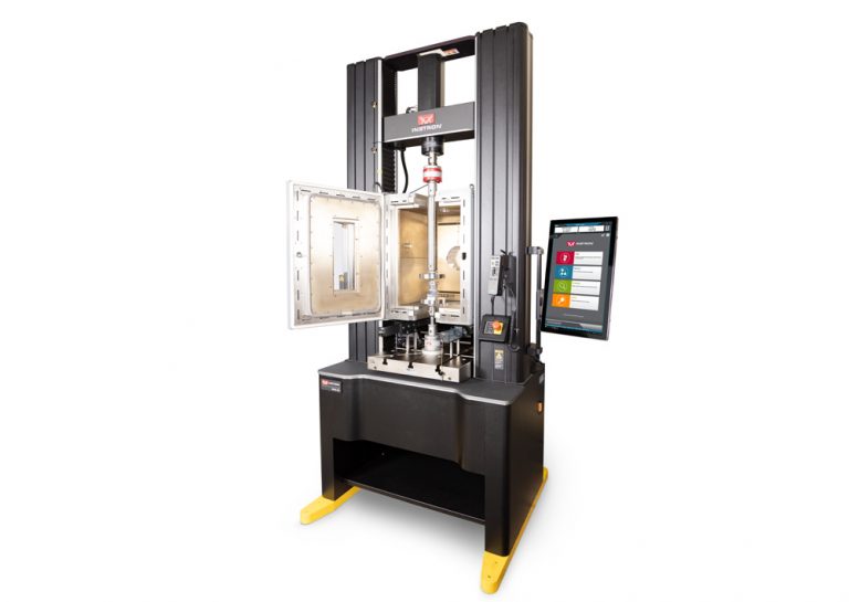 The Instron 68FM universal testing system in a tall base configuration with environmental chamber, torsion add-on, and compression platens — delivering versatile elevated temperature mechanical testing capability for metals, composites, and component testing applications.