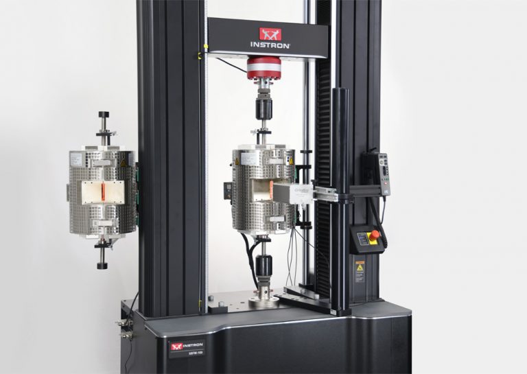 Instron 68FM-100 universal testing system with two high-temperature furnaces mounted on the frame for elevated temperature metals tensile testing.