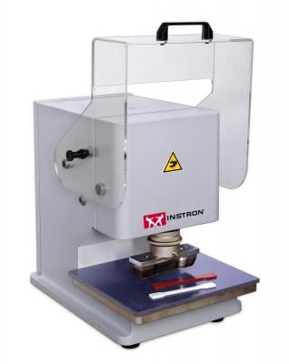 Specimen punching machine